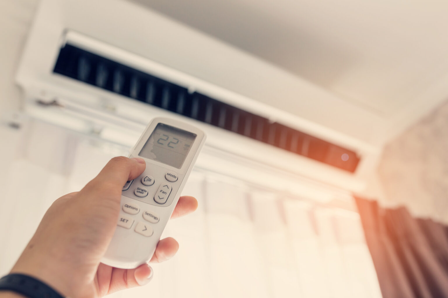 air conditioner blowing warm